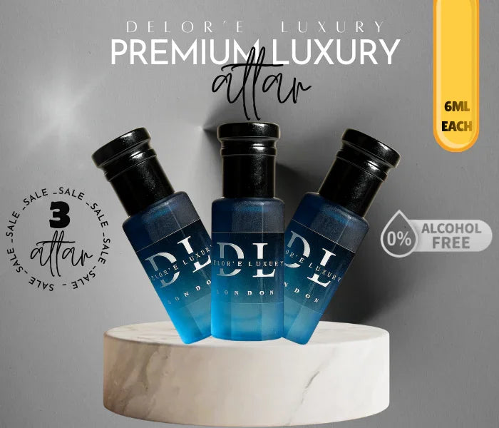 Three 6ml blue and black bottles of Delore Luxury Premium Attar perfume displayed on a marble pedestal, alcohol-free